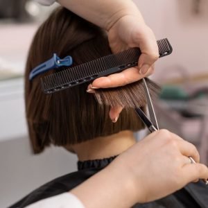 woman-getting-treatment-hairdresser-shop_23-2149229816.jpg
